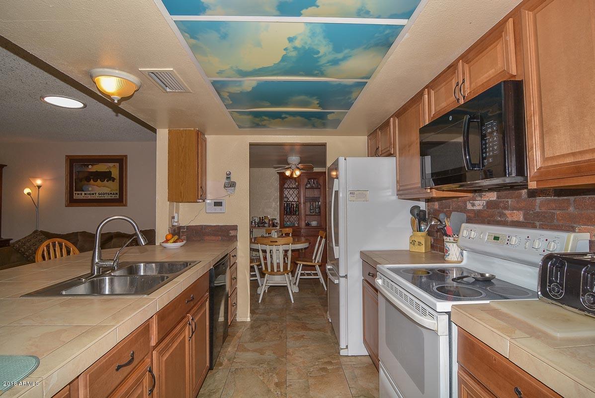 5254 West Redfield Road Glendale, AZ 85306 - Photo 7 of 28 Kitchen-Dining Room