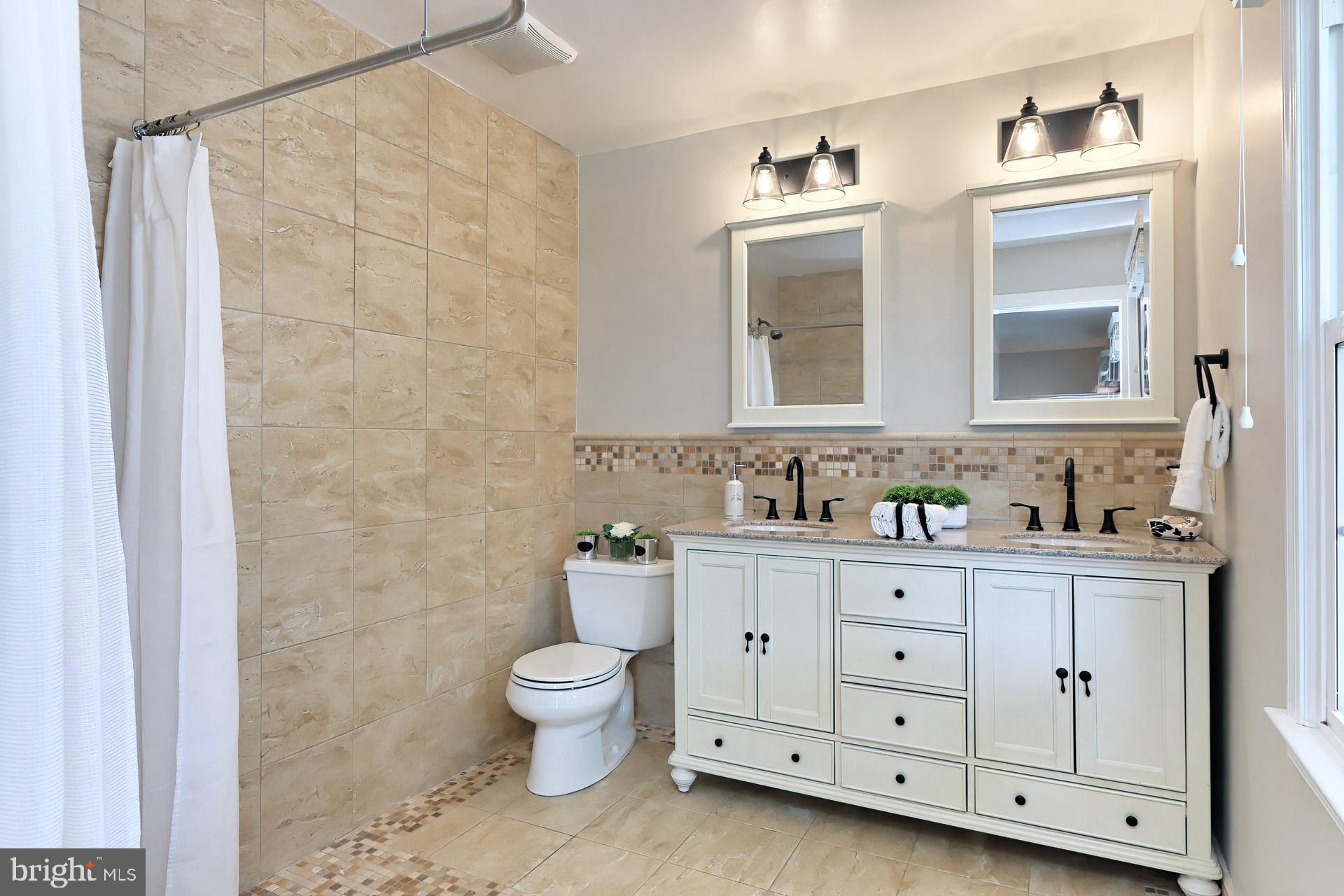 7004 Maple Tree Lane Springfield, VA 22152 - Photo 29 of 58 New dbl vanity, mirror, light fixtures, faucets