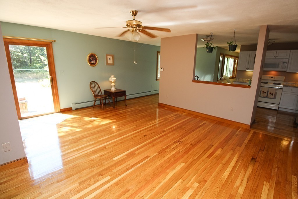 177 Glenwood Road Rutland, MA 01543 - Photo 13 of 30 a room with wooden floor and furniture