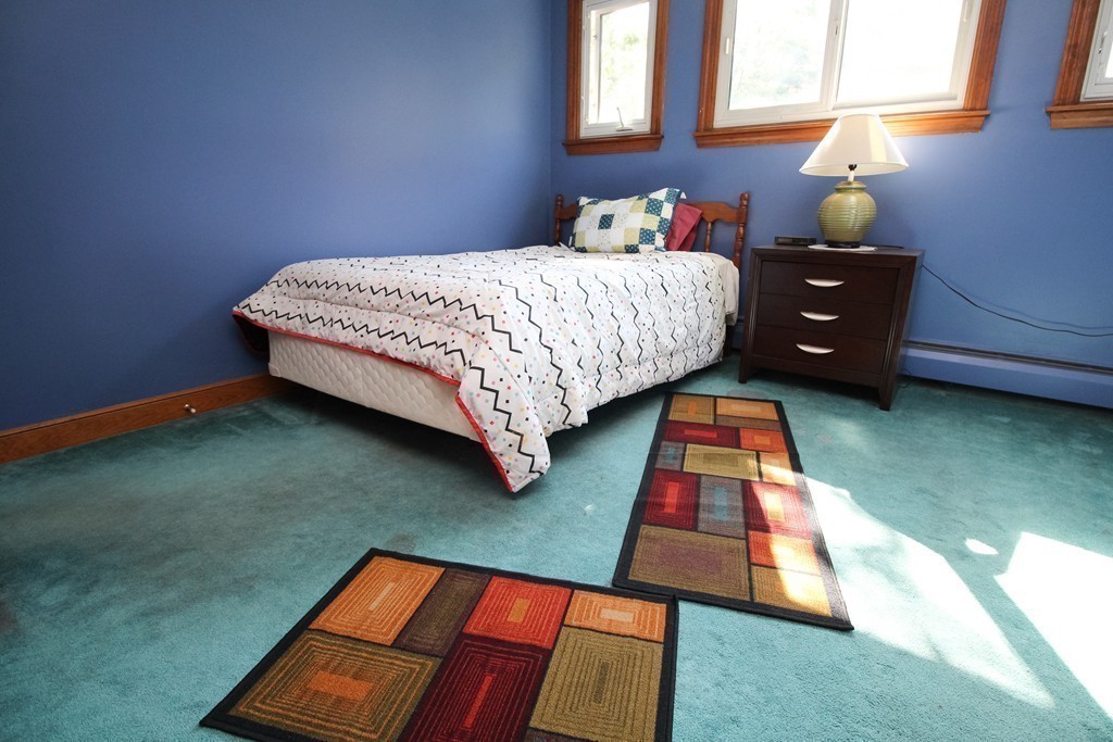 177 Glenwood Road Rutland, MA 01543 - Photo 28 of 30 a bedroom with a bed and a window