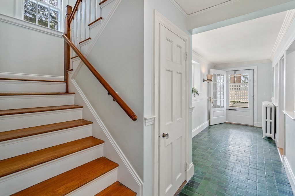 164 Carlton Road Newton, MA 02468 - Photo 11 of 27 a view of entryway with wooden floor and stairs