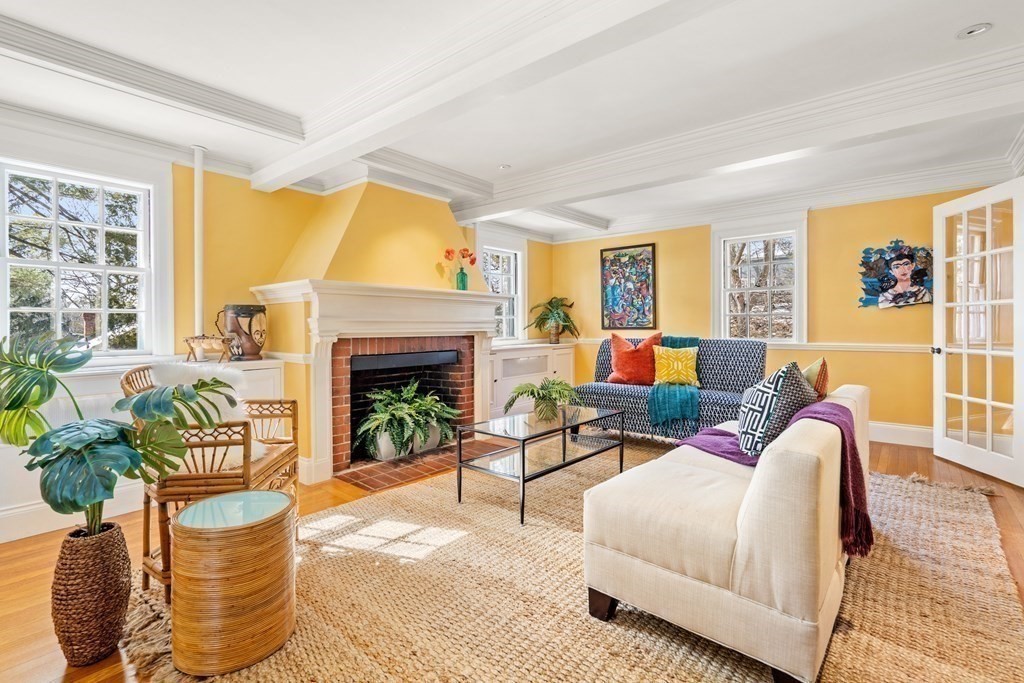 164 Carlton Road Newton, MA 02468 - Photo 12 of 27 a living room with furniture and a fireplace