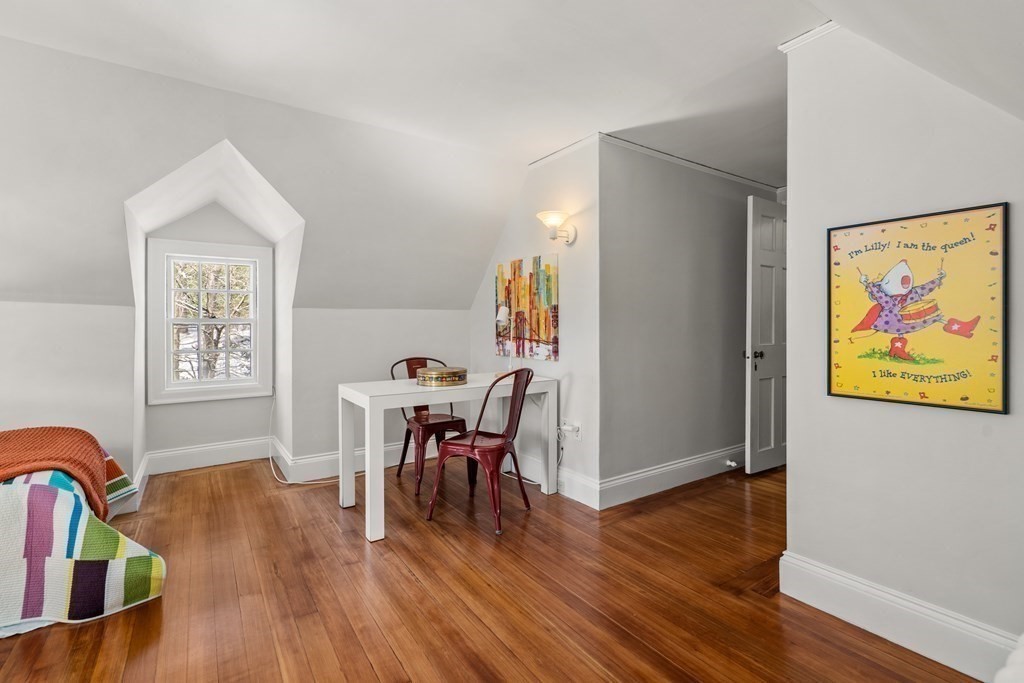 164 Carlton Road Newton, MA 02468 - Photo 23 of 27 a view of a dining room with furniture window and wooden floor