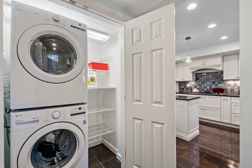 164 Carlton Road Newton, MA 02468 - Photo 9 of 27 a kitchen with a washer and dryer