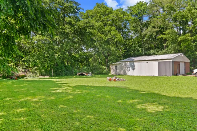 a house view with a garden space