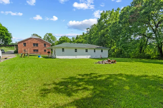 a backyard of a house with lots of green space