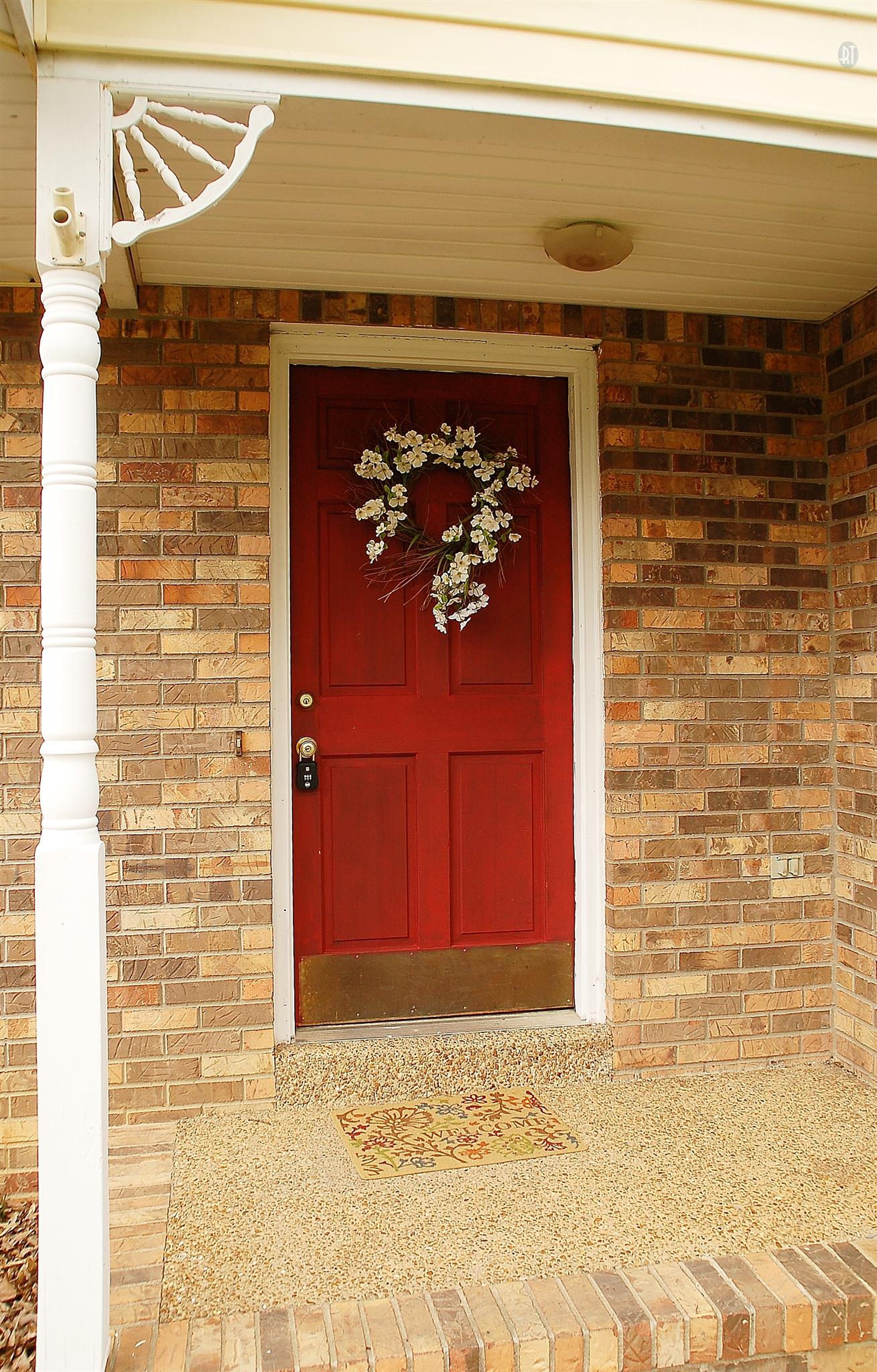 7112 Totty Road Fairview, TN 37062 - Photo 3 of 14 a front view of a fireplace with wooden floor