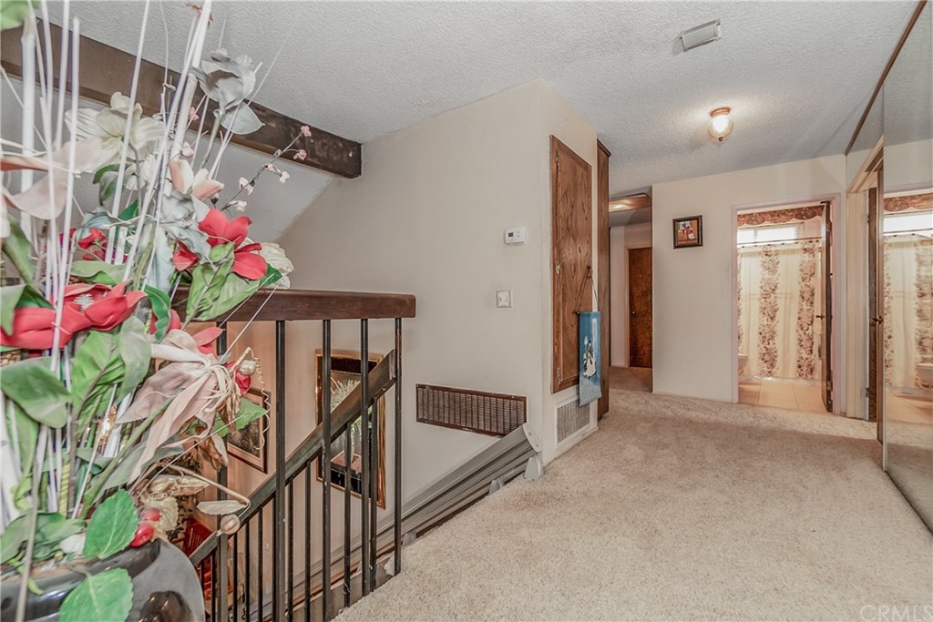 6717 Rycroft Drive Riverside, CA 92506 - Photo 11 of 28 a view of entryway with an entryway and wooden floor