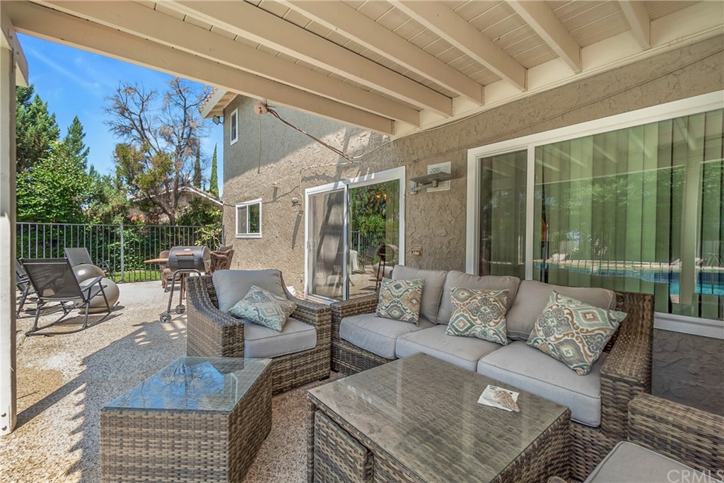 6717 Rycroft Drive Riverside, CA 92506 - Photo 20 of 28 a living room with furniture and a large window