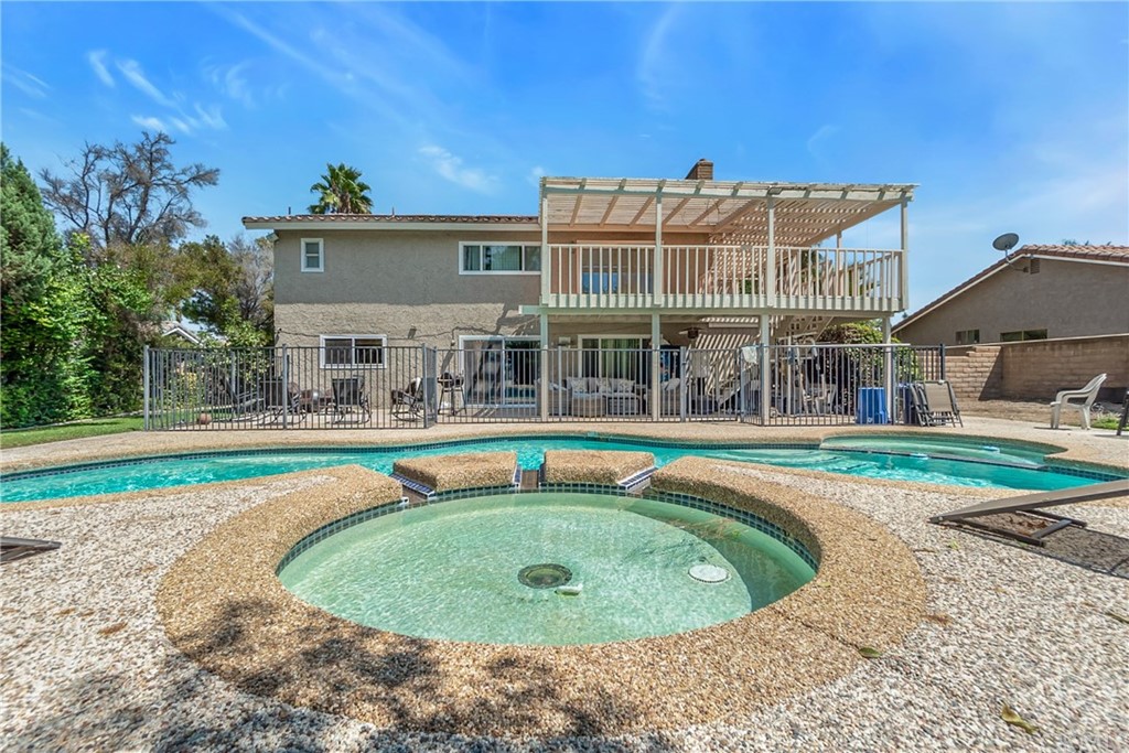 6717 Rycroft Drive Riverside, CA 92506 - Photo 26 of 28 a view of outdoor space yard swimming pool and porch