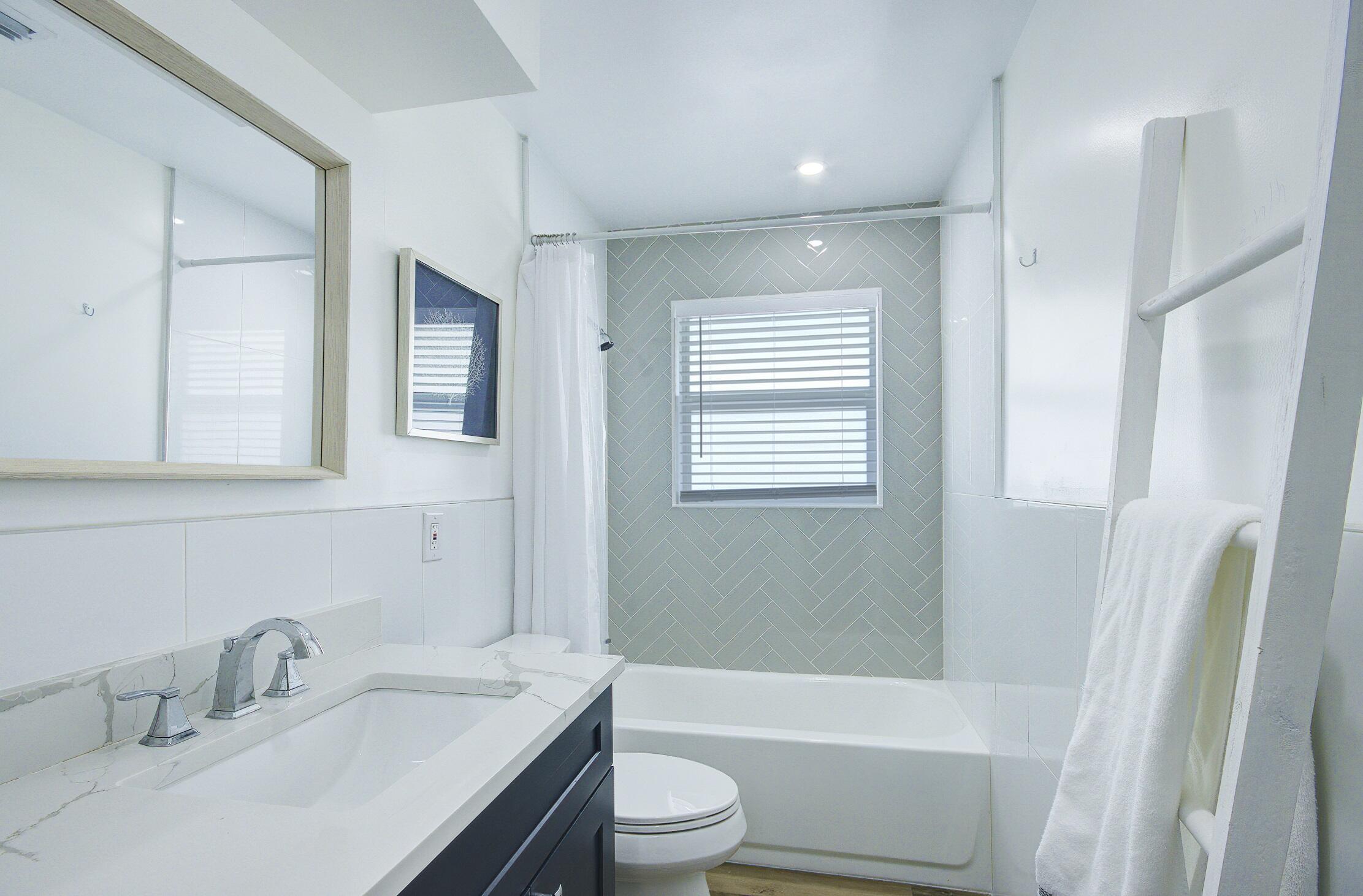 1950 Northeast 30th Street Lighthouse Point, FL 33064 - Photo 12 of 25 1950 guest bathroom