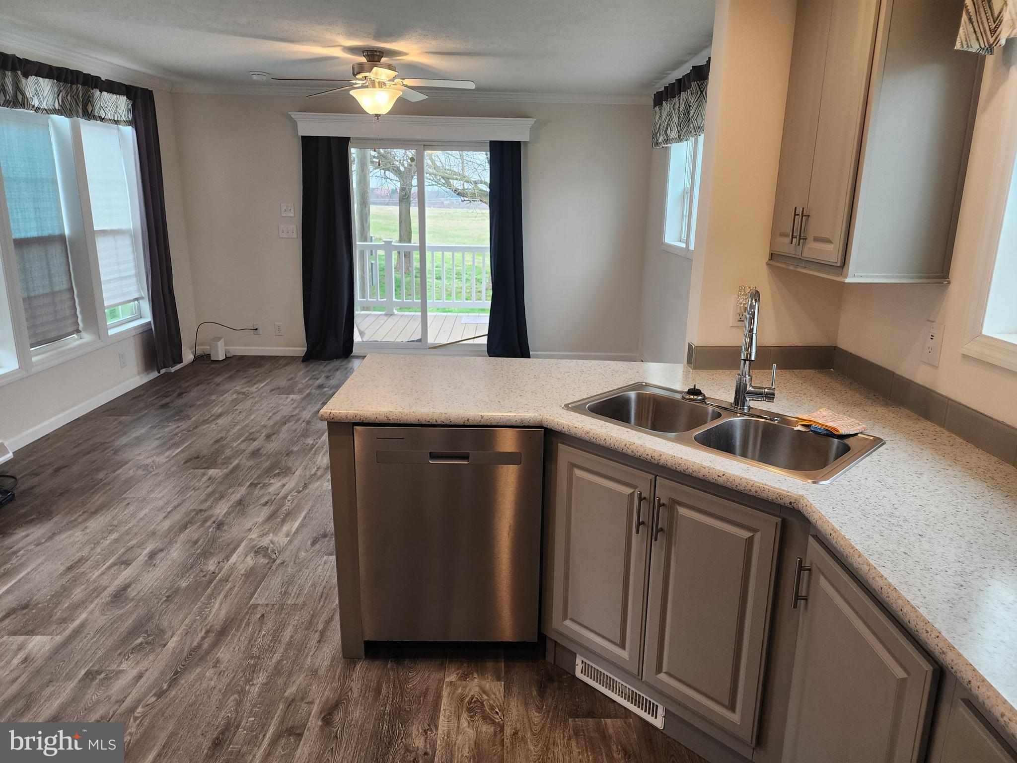 165 West Ridge Pike, Unit 260 Royersford, PA 19468 - Photo 15 of 15 a kitchen with a sink cabinets and wooden floor