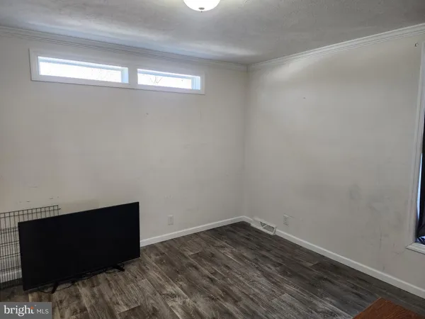 a kitchen with a stove and a microwave