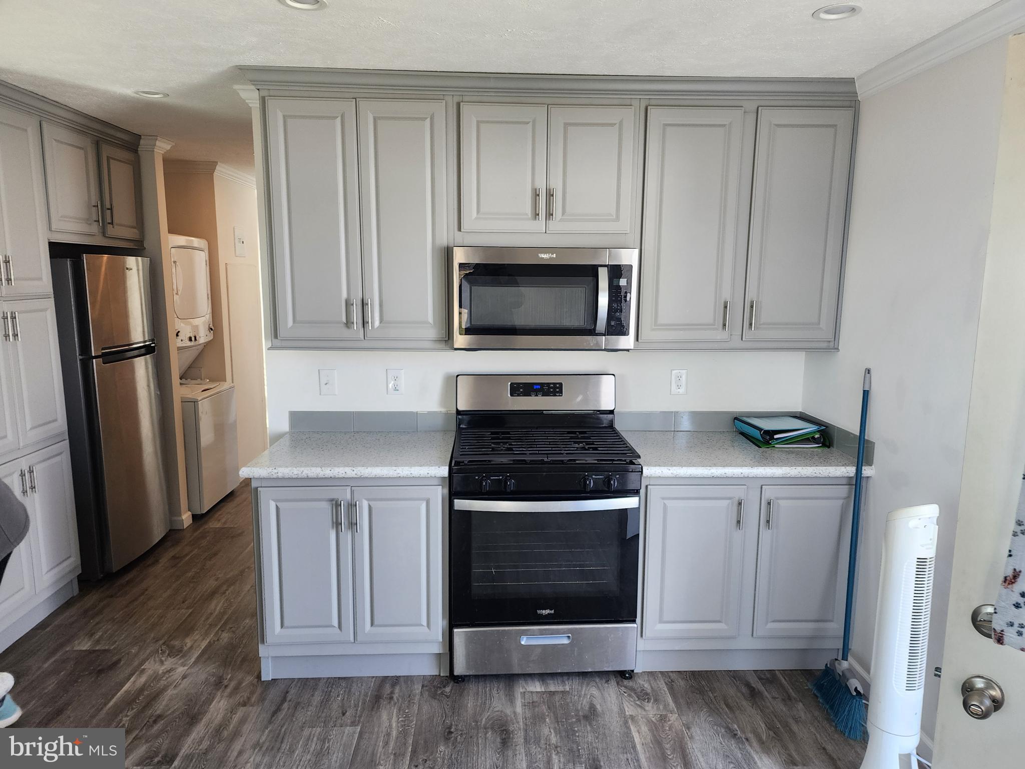 165 West Ridge Pike, Unit 260 Royersford, PA 19468 - Photo 9 of 15 a kitchen with a stove and a microwave