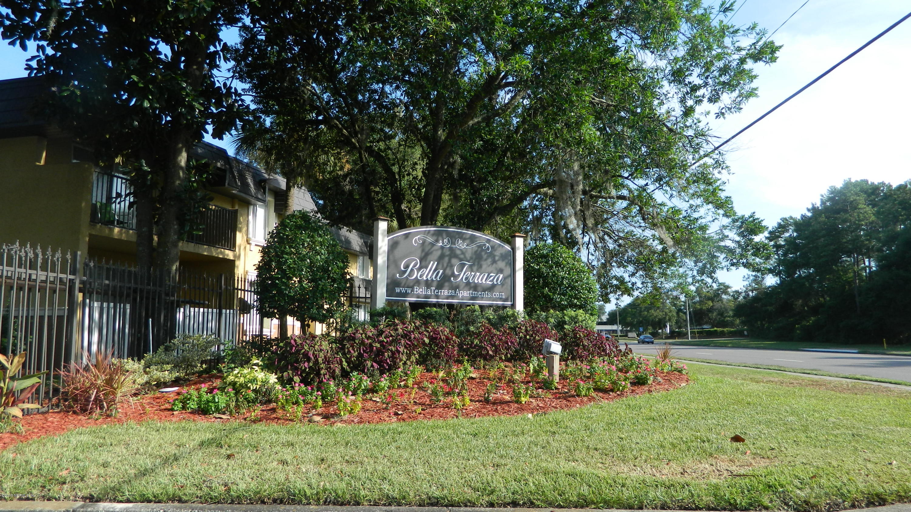 355 Monument Road, Unit 22D2 Jacksonville, FL 32225 - Photo 1 of 14 a view of a chair and table in the yard