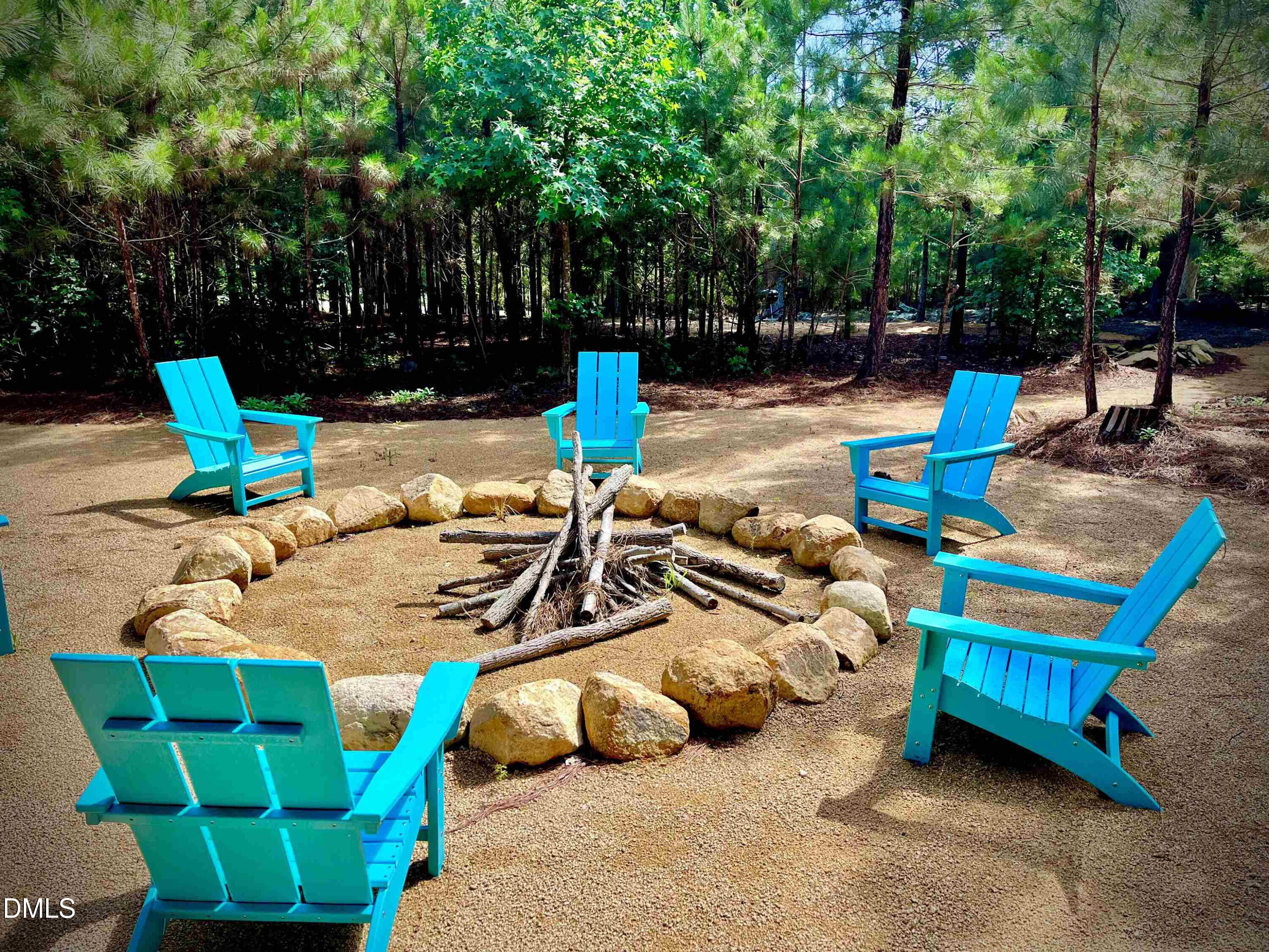120 Anfield Road New Hill, NC 27562 - Photo 28 of 31 a view of backyard with swimming pool and seating space