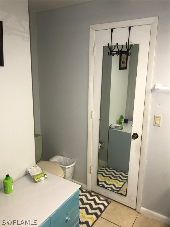 7312 Pebble Beach Road Fort Myers, FL 33967 - Photo 16 of 30 a bathroom with a sink and toilet