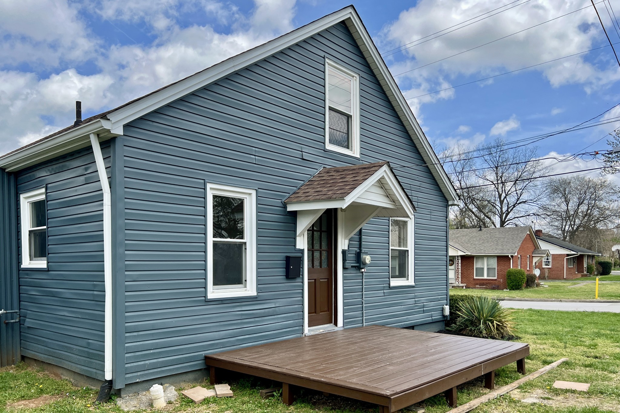 401 North High Street Franklin, KY 42134 - Photo 24 of 28 a view of a house with a yard and wooden fence