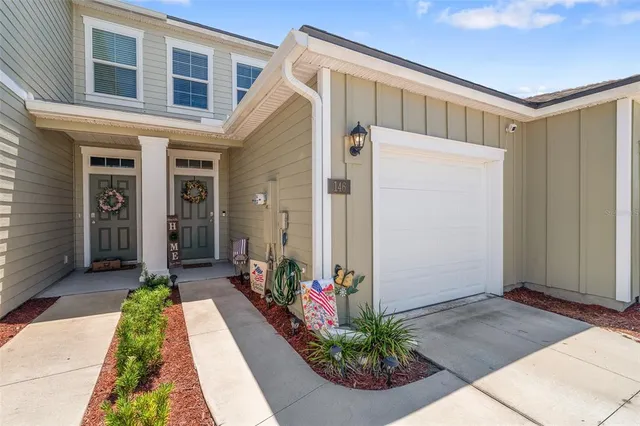 a front view of a house with a porch