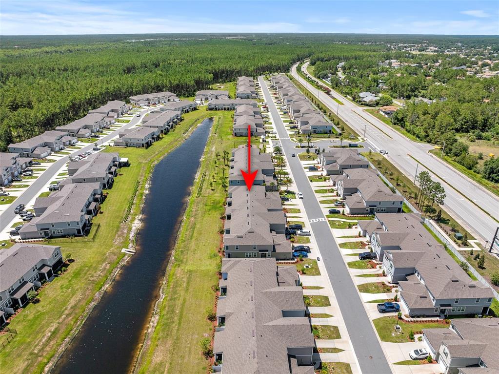 146 Redbud Road Palm Coast, FL 32137 - Photo 12 of 40 a view of city and swimming pool