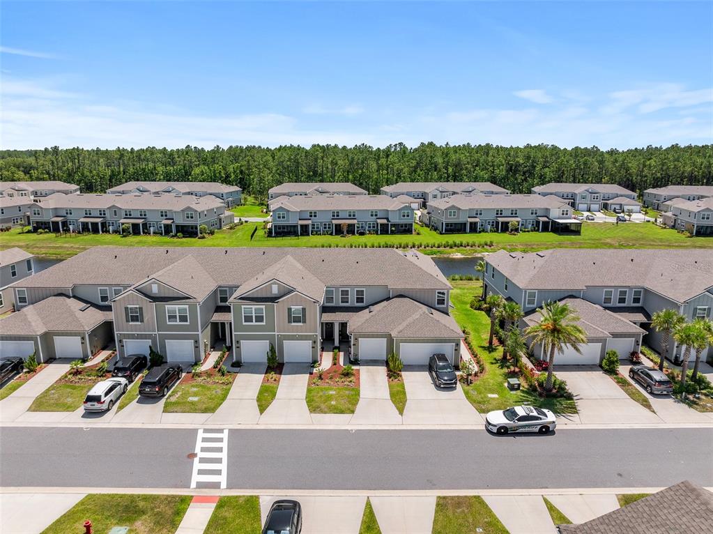 146 Redbud Road Palm Coast, FL 32137 - Photo 13 of 40 a view of an outdoor space and swimming pool
