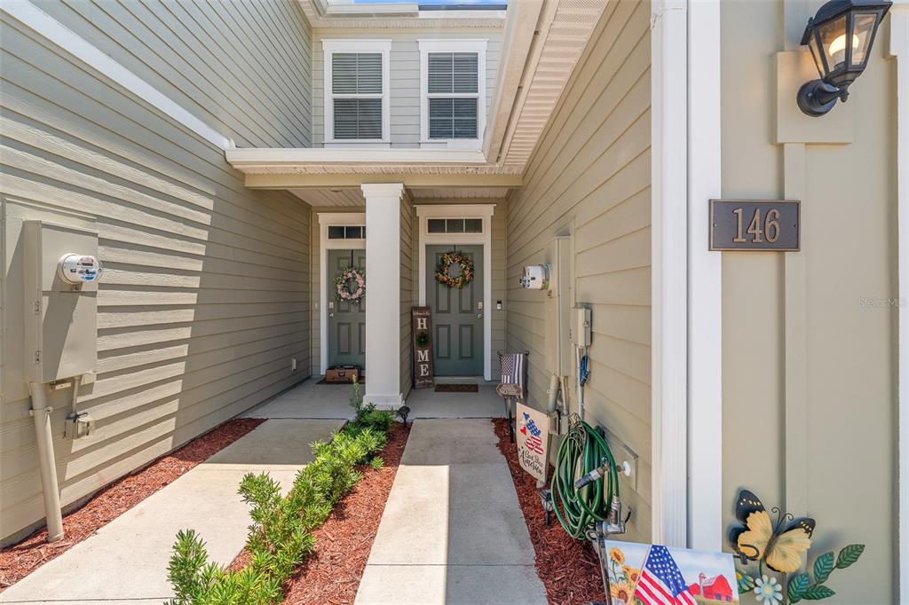146 Redbud Road Palm Coast, FL 32137 - Photo 16 of 40 a front view of a house