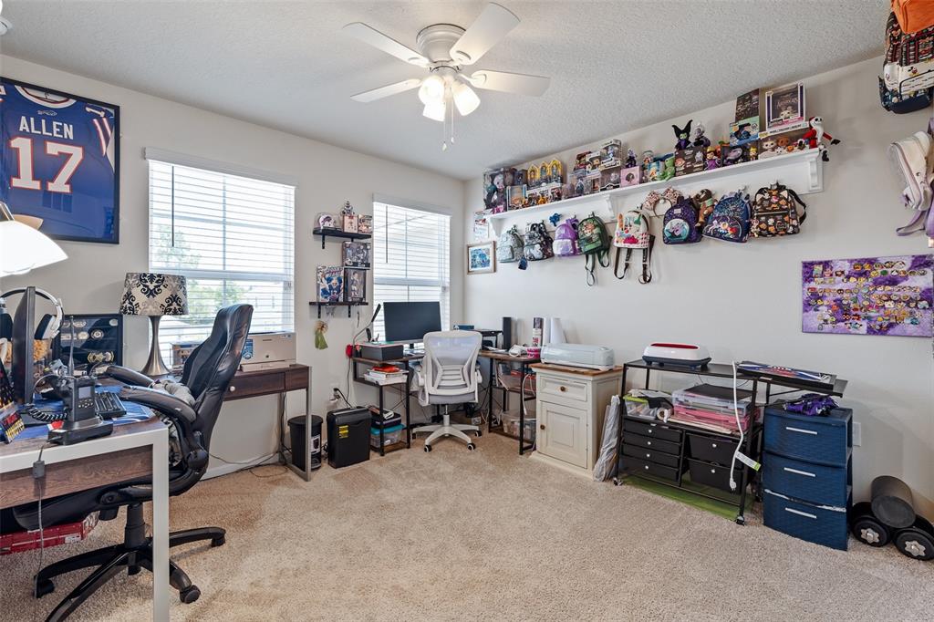 146 Redbud Road Palm Coast, FL 32137 - Photo 34 of 40 a room with furniture and a window