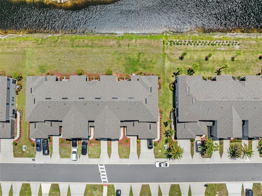 146 Redbud Road Palm Coast, FL 32137 - Photo 39 of 40 an aerial view of residential houses with outdoor space and swimming pool