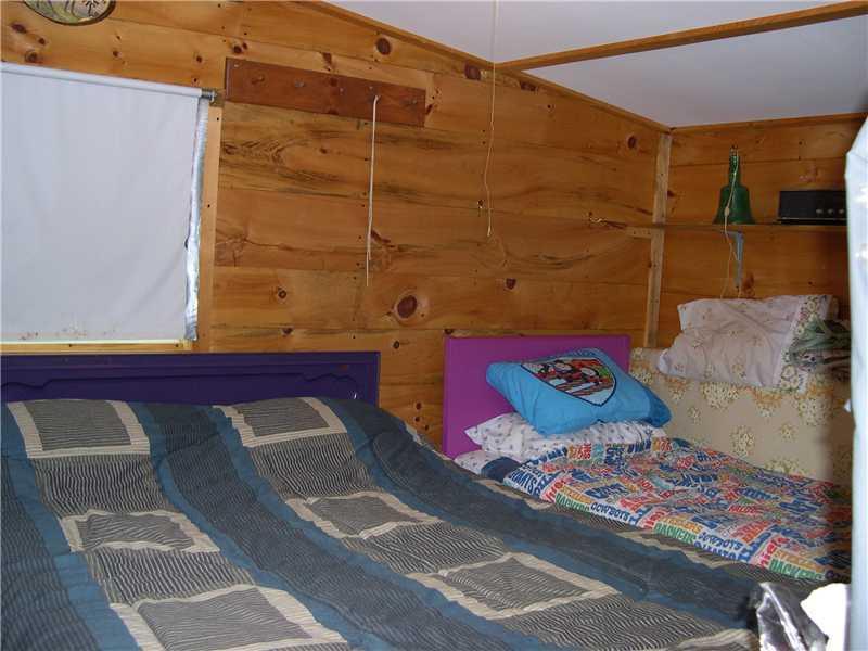 96 Bald Mountain Road Rangeley, ME 04964 - Photo 5 of 14 Master Bedroom. Front bedroom has...