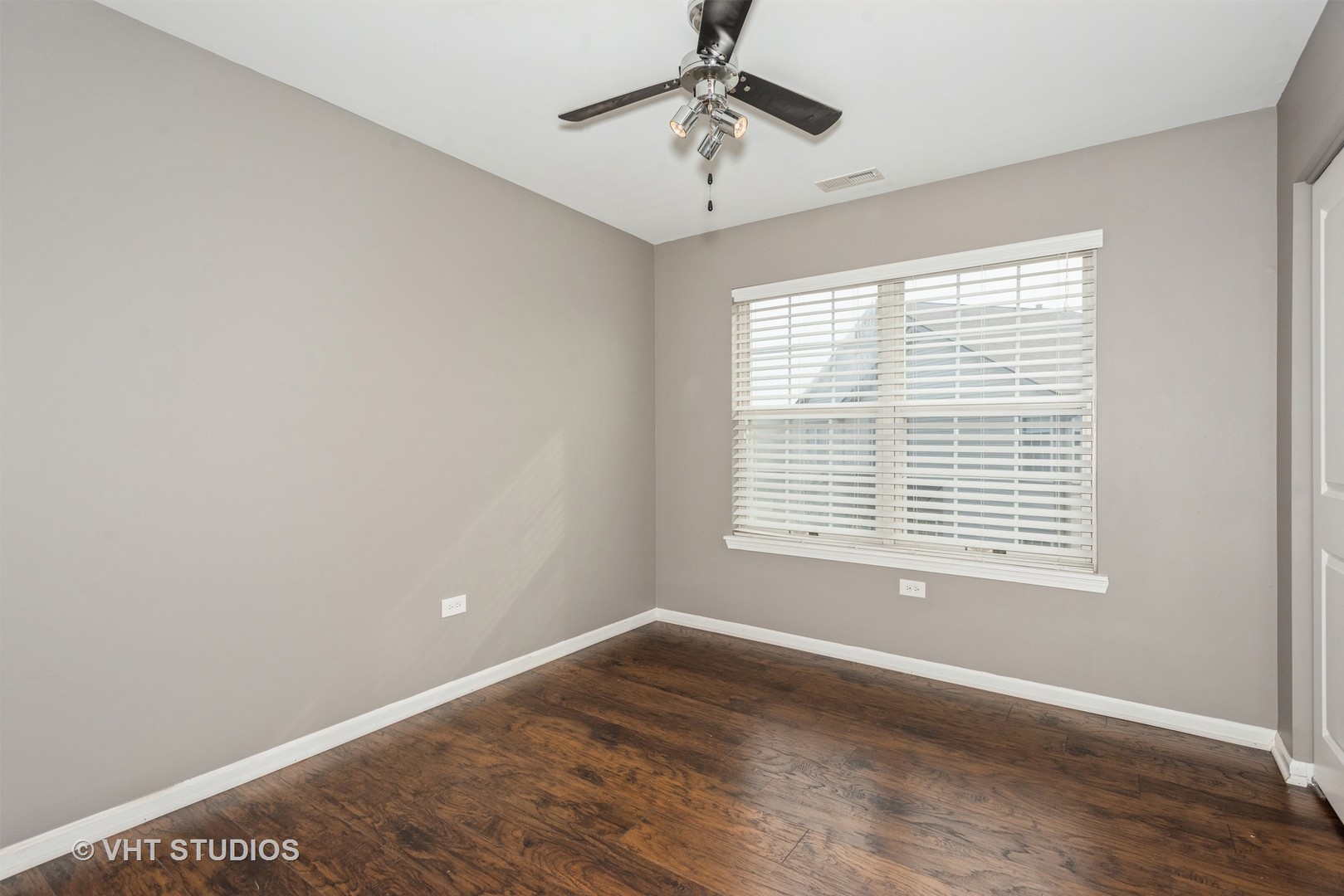 644 Lancaster Circle Elgin, IL 60123 - Photo 12 of 21 a view of an empty room with a window