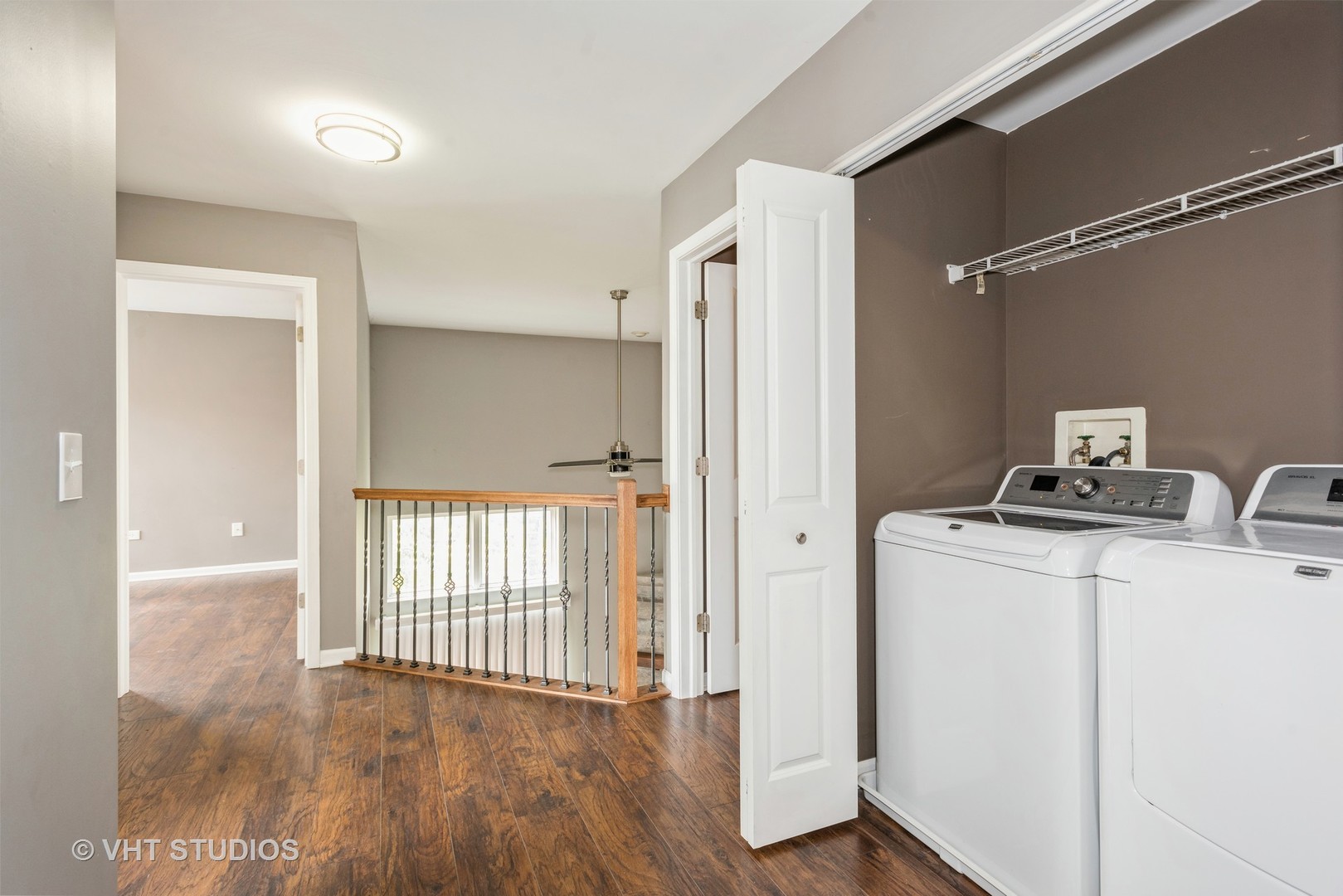 644 Lancaster Circle Elgin, IL 60123 - Photo 14 of 21 a view of storage and utility room with closet wooden floor and windows