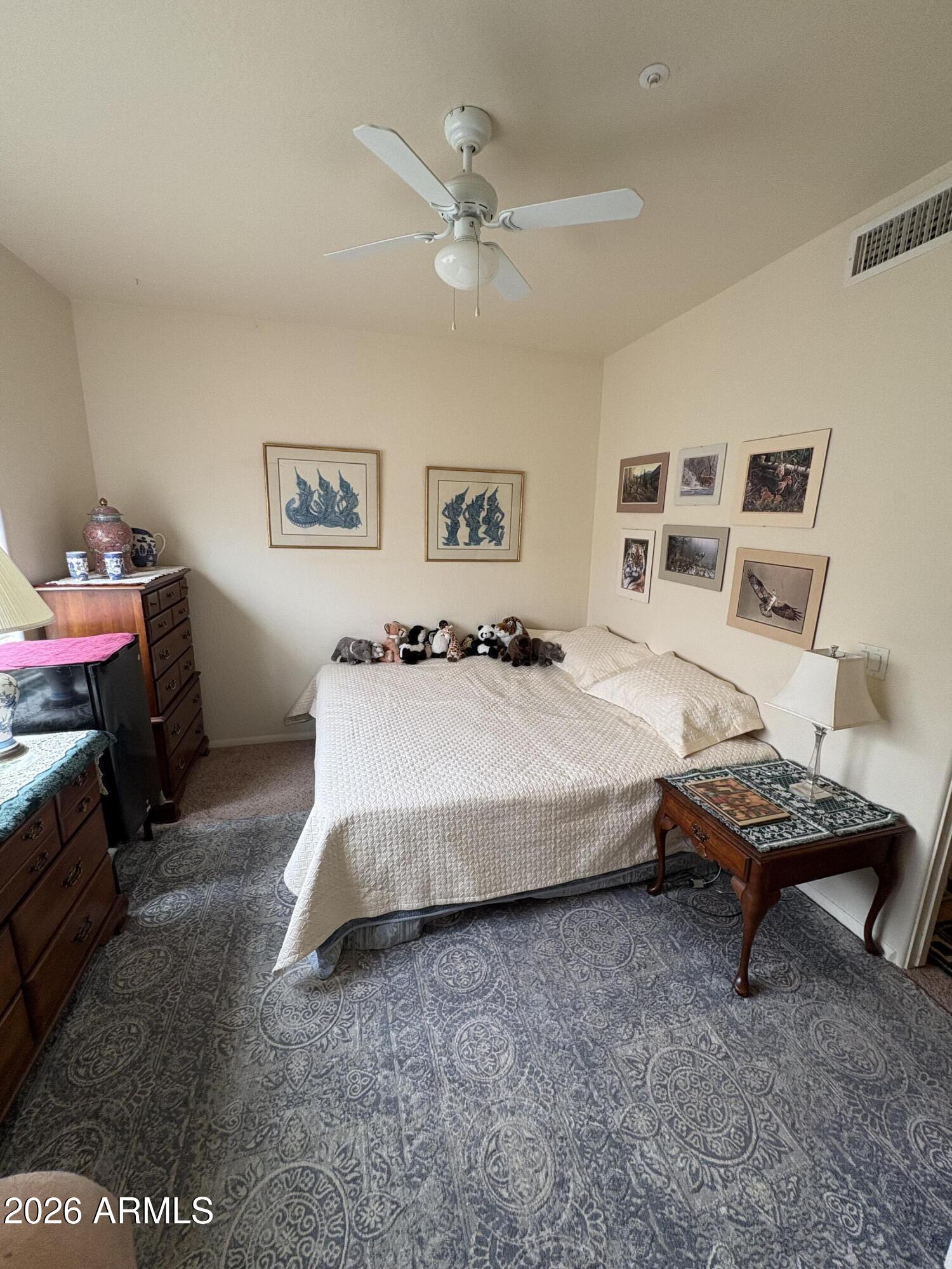4210 North Montezuma Avenue, Unit 12 Rimrock, AZ 86335 - Photo 11 of 17 a spacious bedroom with a bed and a desk