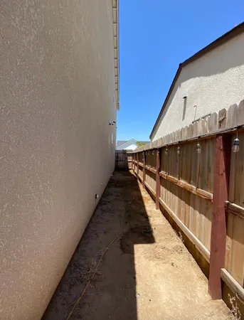 a view of balcony with wooden floor