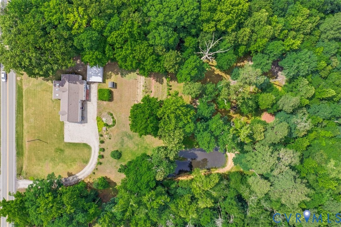 18501 Branders Bridge Road Colonial Heights, VA 23834 - Photo 34 of 43 an aerial view of residential house with outdoor space and trees all around