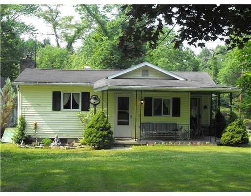 552 Weaver Mill Road Rector, PA 15677 - Photo 2 of 11 Exterior Front. Lovingly maintained home with wrap around porch! Sit outside and watch the deer as they pass through your yard!