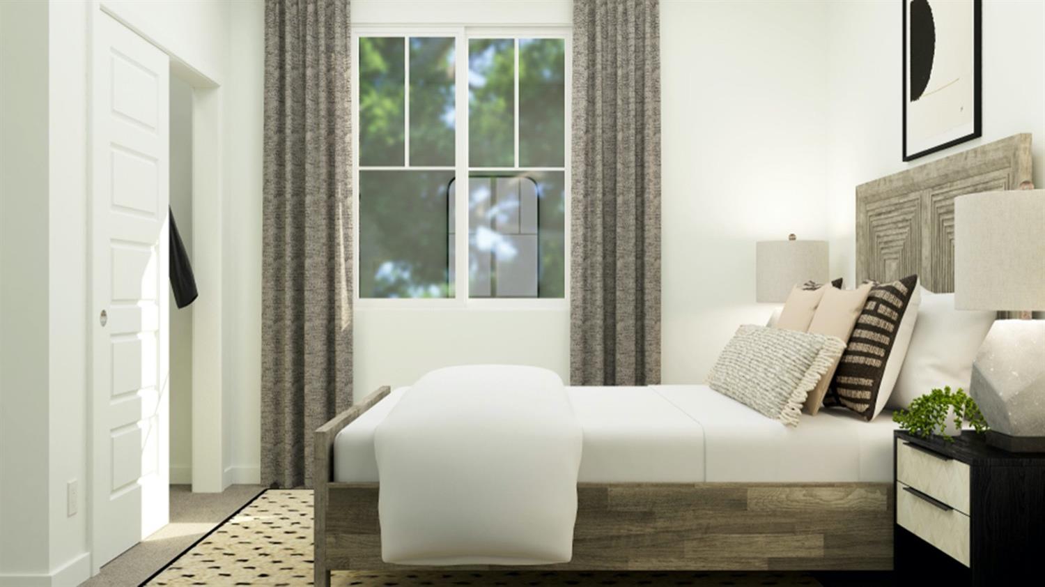 1778 North Aster Lake Road, Unit 60 Hanford, CA 93230 - Photo 11 of 14 a bedroom with a bed and a window with chair