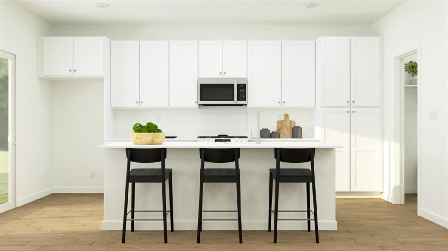 1778 North Aster Lake Road, Unit 60 Hanford, CA 93230 - Photo 2 of 14 a kitchen with stainless steel appliances kitchen island granite countertop a table and chairs in it