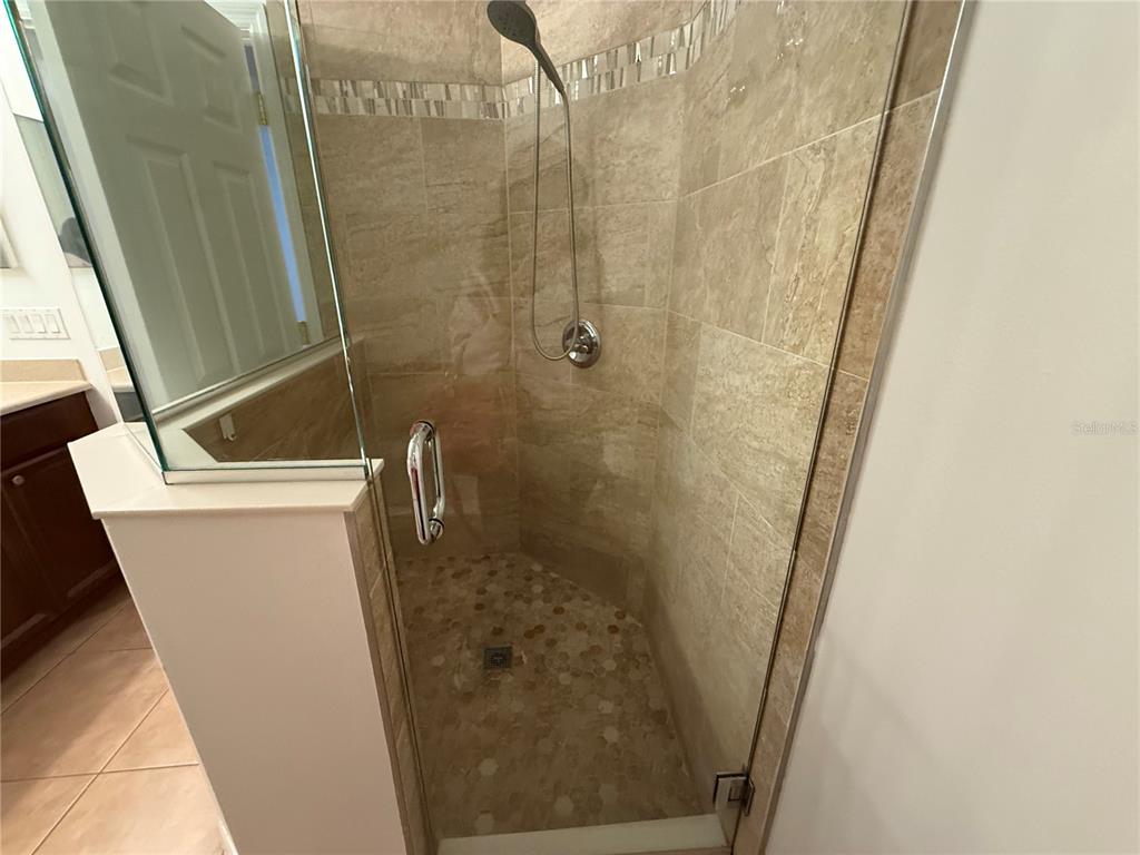 2624 Sweet Magnolia Place Oviedo, FL 32765 - Photo 16 of 25 a bathroom with a sink and toilet