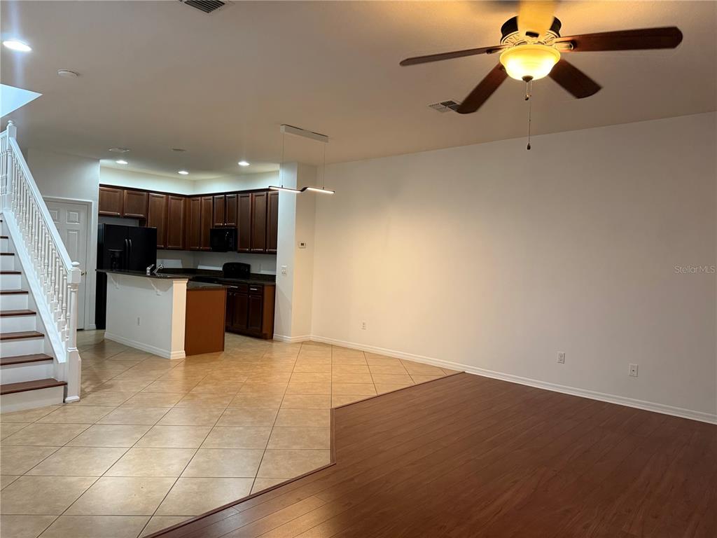 2624 Sweet Magnolia Place Oviedo, FL 32765 - Photo 4 of 25 wooden floor in kitchen and a room with wooden floor