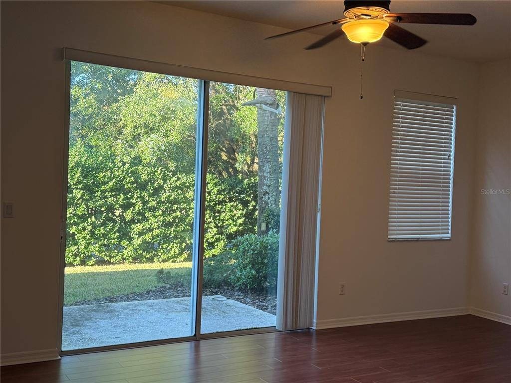 2624 Sweet Magnolia Place Oviedo, FL 32765 - Photo 9 of 25 a view of a livingroom with a staircase