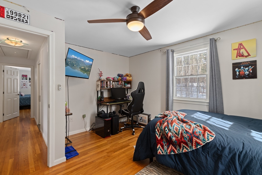 180 Rowley Bridge Road Topsfield, MA 01983 - Photo 24 of 42 a bed room with a bed and a window