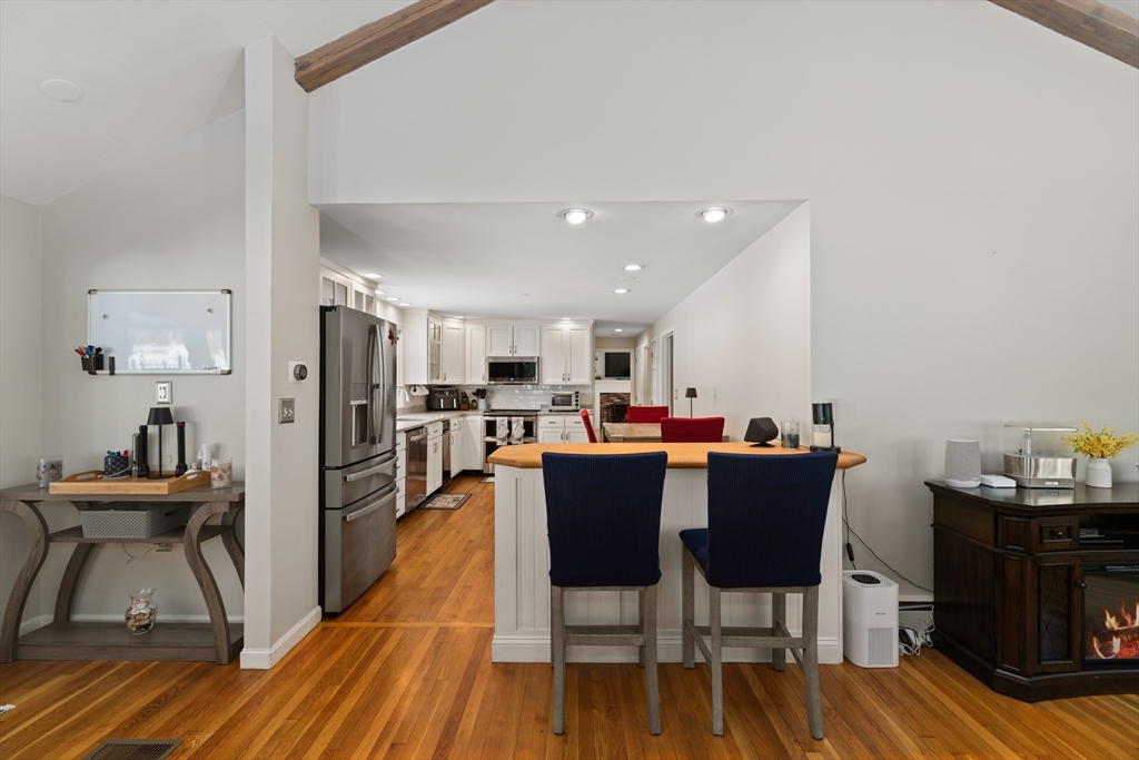 180 Rowley Bridge Road Topsfield, MA 01983 - Photo 7 of 42 a dining room with furniture and wooden floor