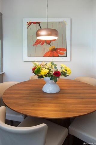 a room with table and chairs