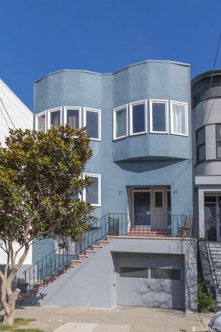 a view of house with outdoor space and sitting space
