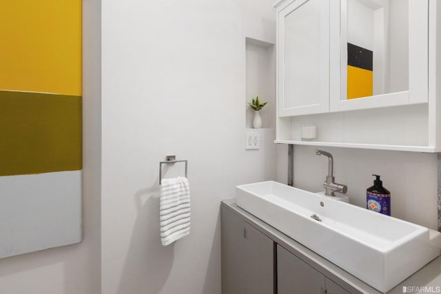 a bathroom with a sink and a toilet