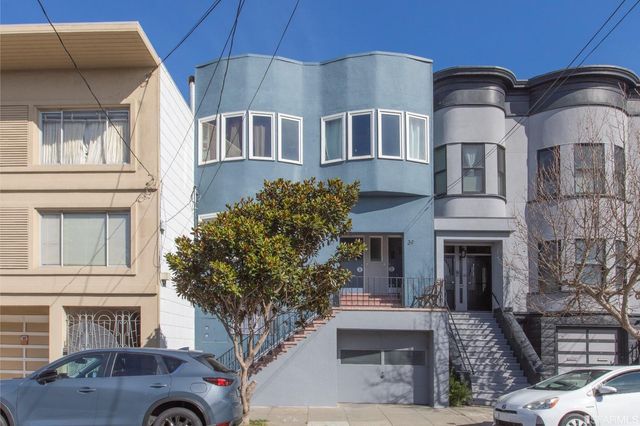 a view of a building with sitting area