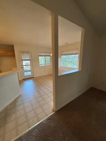 an empty room with windows