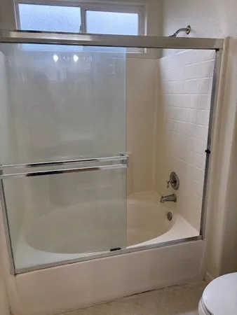 a close view of a bathtub in bathroom