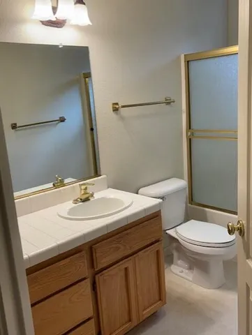 a bathroom with a sink and a toilet