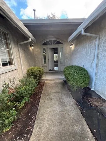 a view of a back yard of the house